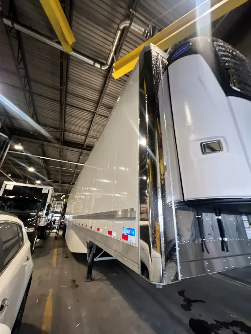 A truck being wrapped in the Big Rig Wraps install bay